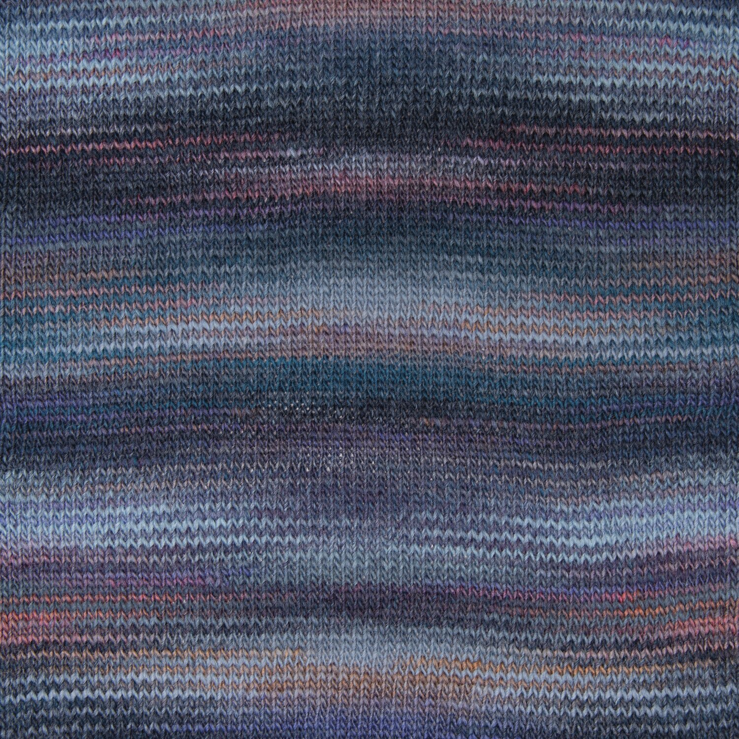 Creative Melange aran Wonderball, gestricktes Muster in Lila-Petrol, 200g 640m, von Rico Design.