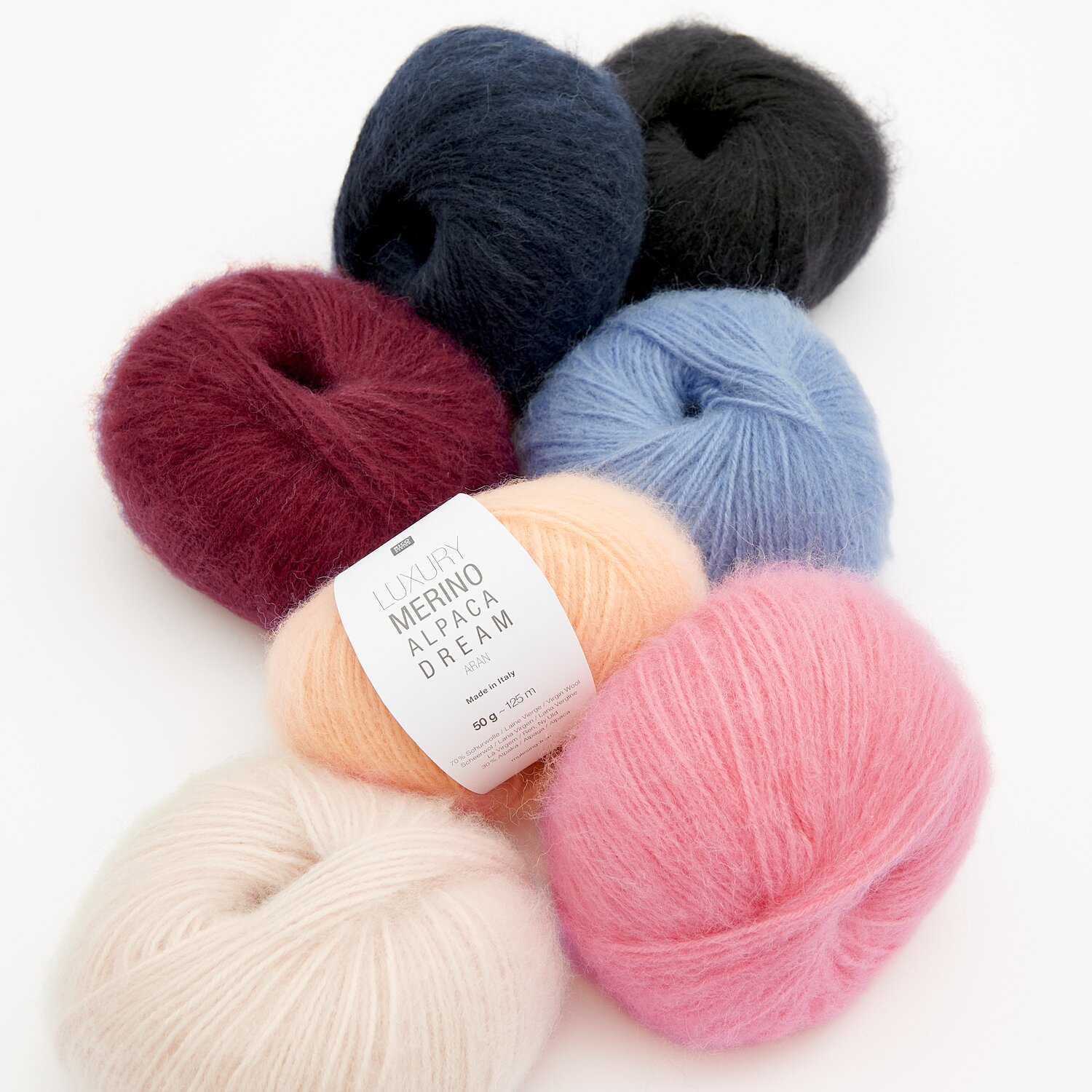 Luxury Merino Alpaca Dream aran, Rico Design, 50g 125m, flauschige Garnknäuel in Creme, Apricot, Pink, Bordeaux, Taubenblau, Marine, Schwarz und Sand.