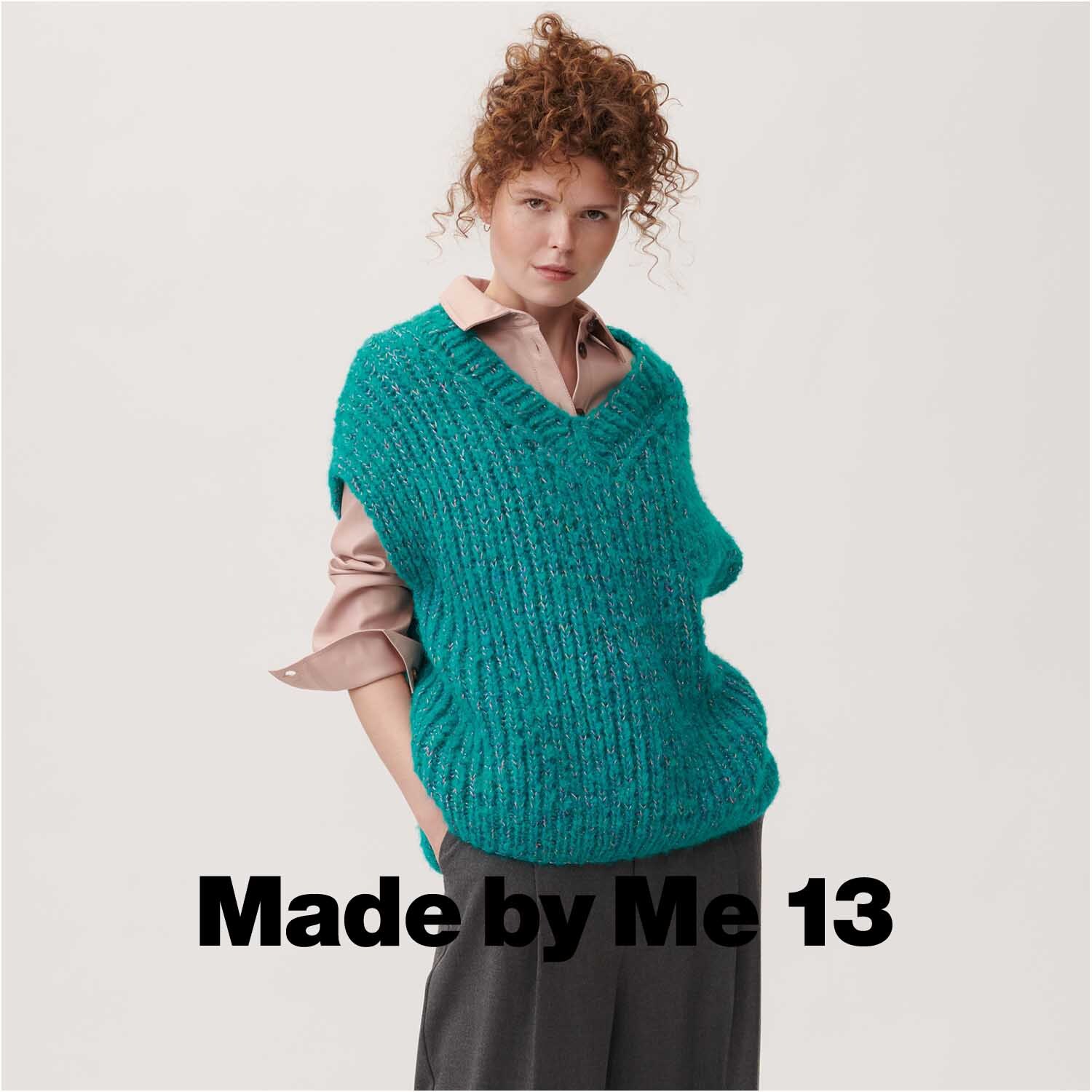 Fashion Light Luxury 50g 130m Farbe Türkis von Rico Design Fashion Light Luxury: Frau trägt türkisfarbenen Strickpullover von Rico Design, kombiniert mit rosa Hemd und grauer Hose.