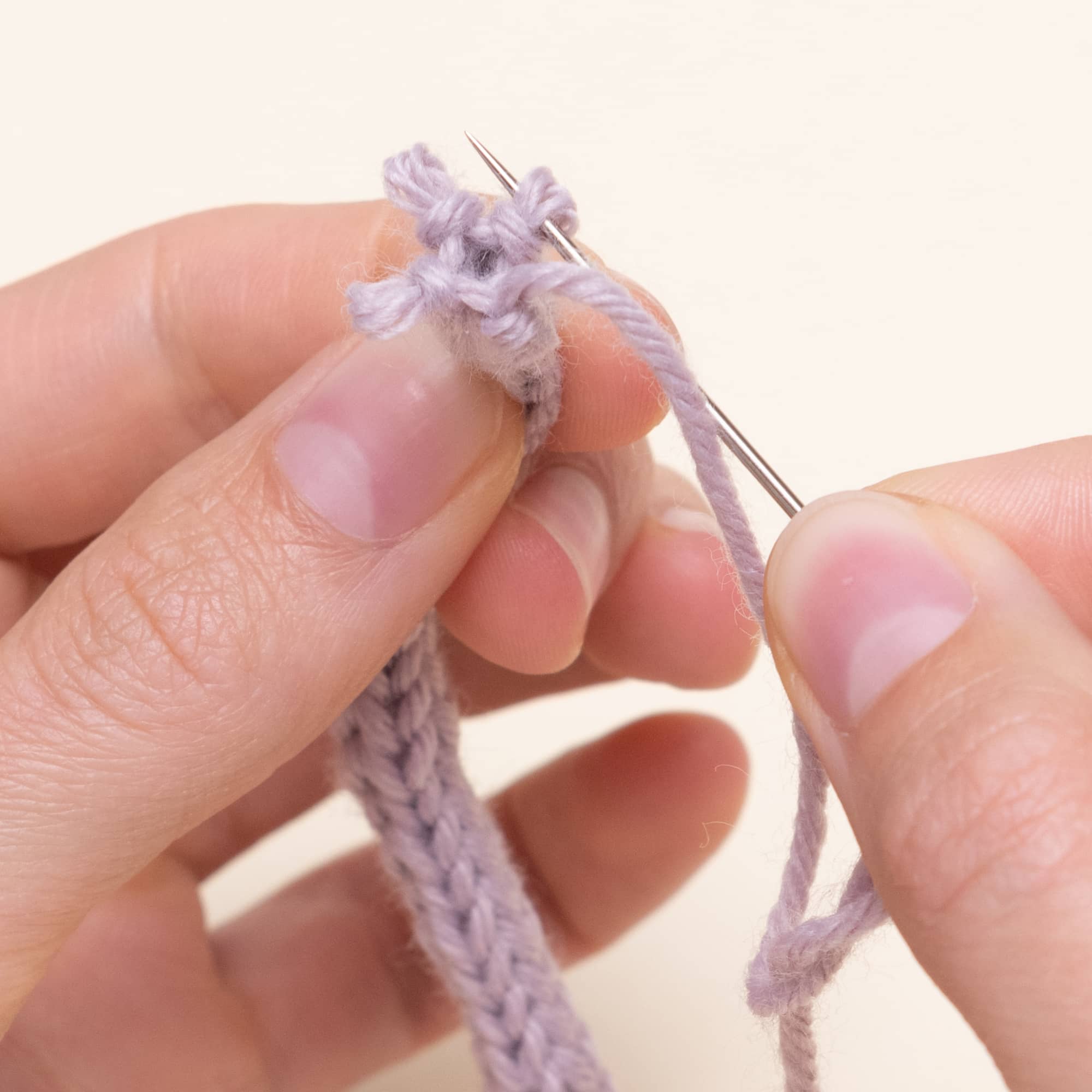 Schritt 15 in der Bedienung einer Strickmühle
