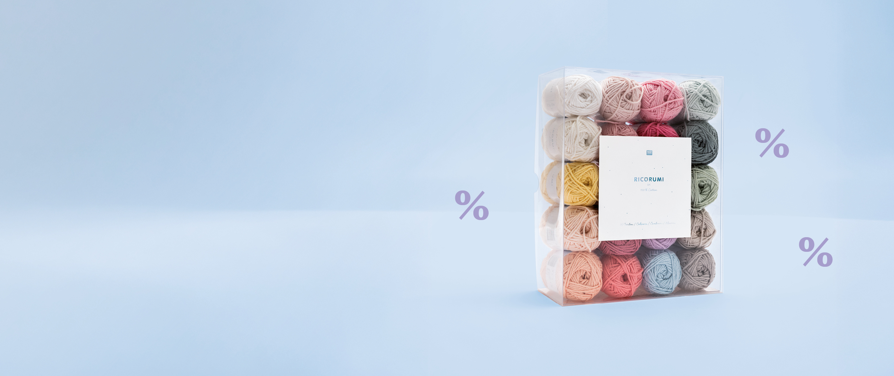 Ricorumi-Garnset in Box auf blauem Hintergrund