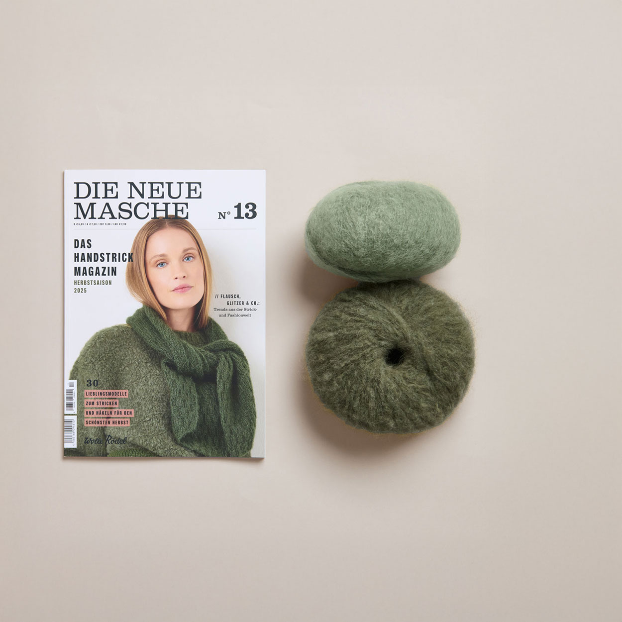 Die Neue Masche Nr.13 daneben zwei Knäule 