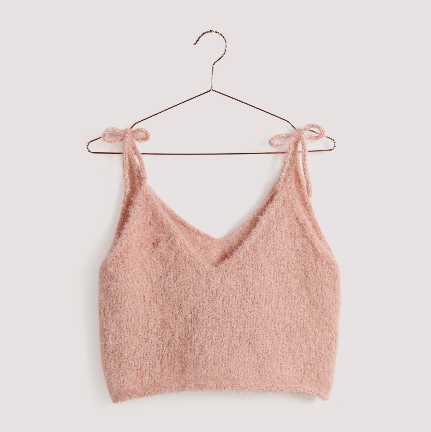 Gestricktes kurzes Top auf Bügel in pink