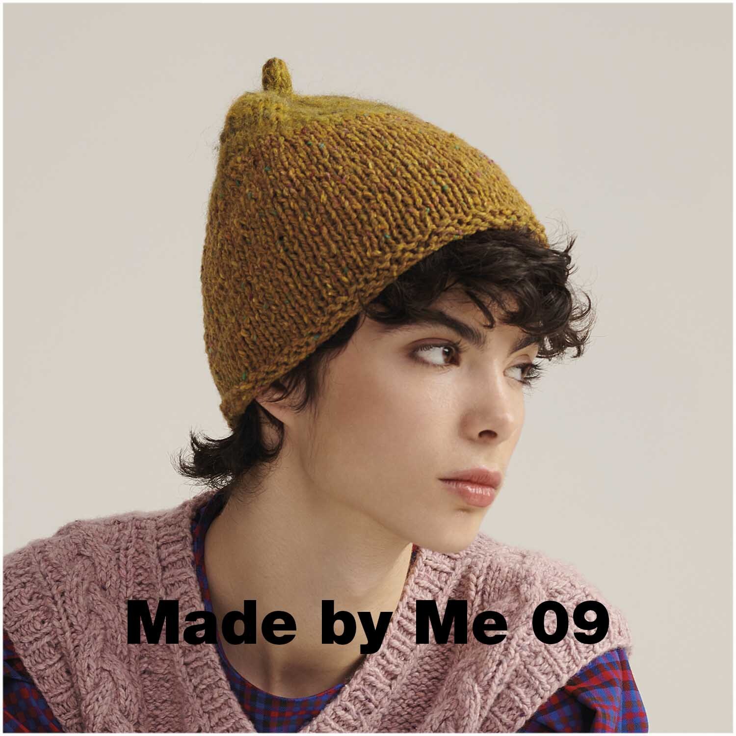Fashion Alpaca Tweed chunky 50g 90m Farbe Senf von Rico Design Fashion Alpaca Tweed chunky: Person trägt eine gestrickte senffarbene Mütze von Rico Design.