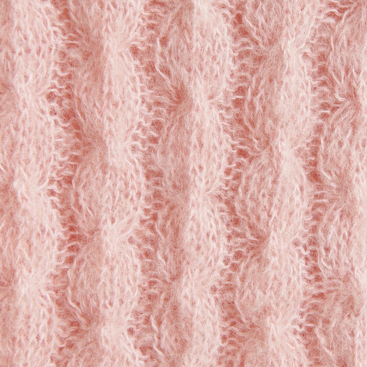 Luxury Alpaca Cotton Fusion zeigt ein apricotfarbenes Strickmuster mit weicher Textur. Ideal für Herbstmode.