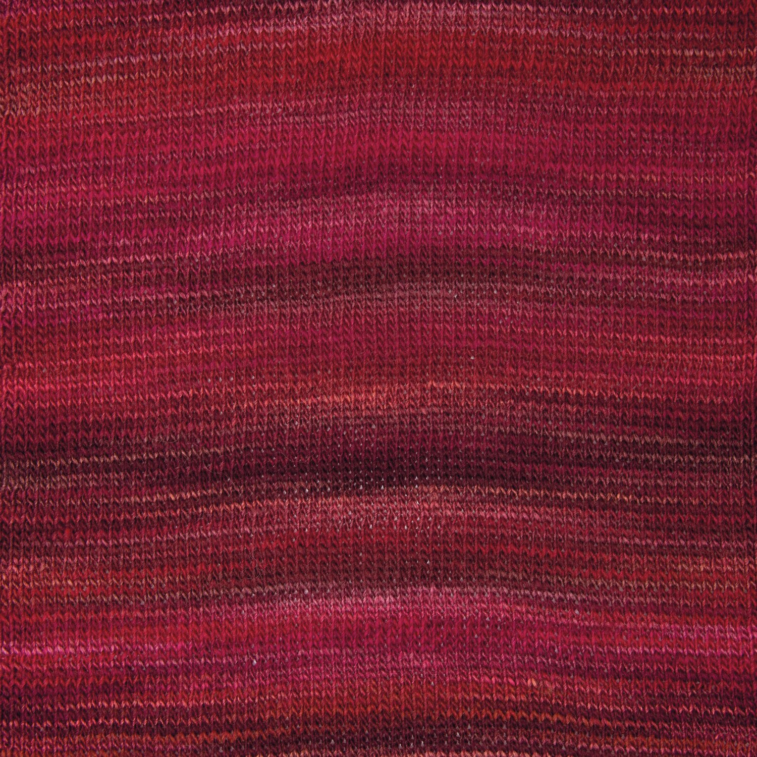 Creative Melange aran Wonderball, gestricktes Muster in Beere Mix, 200g, 640m, von Rico Design.