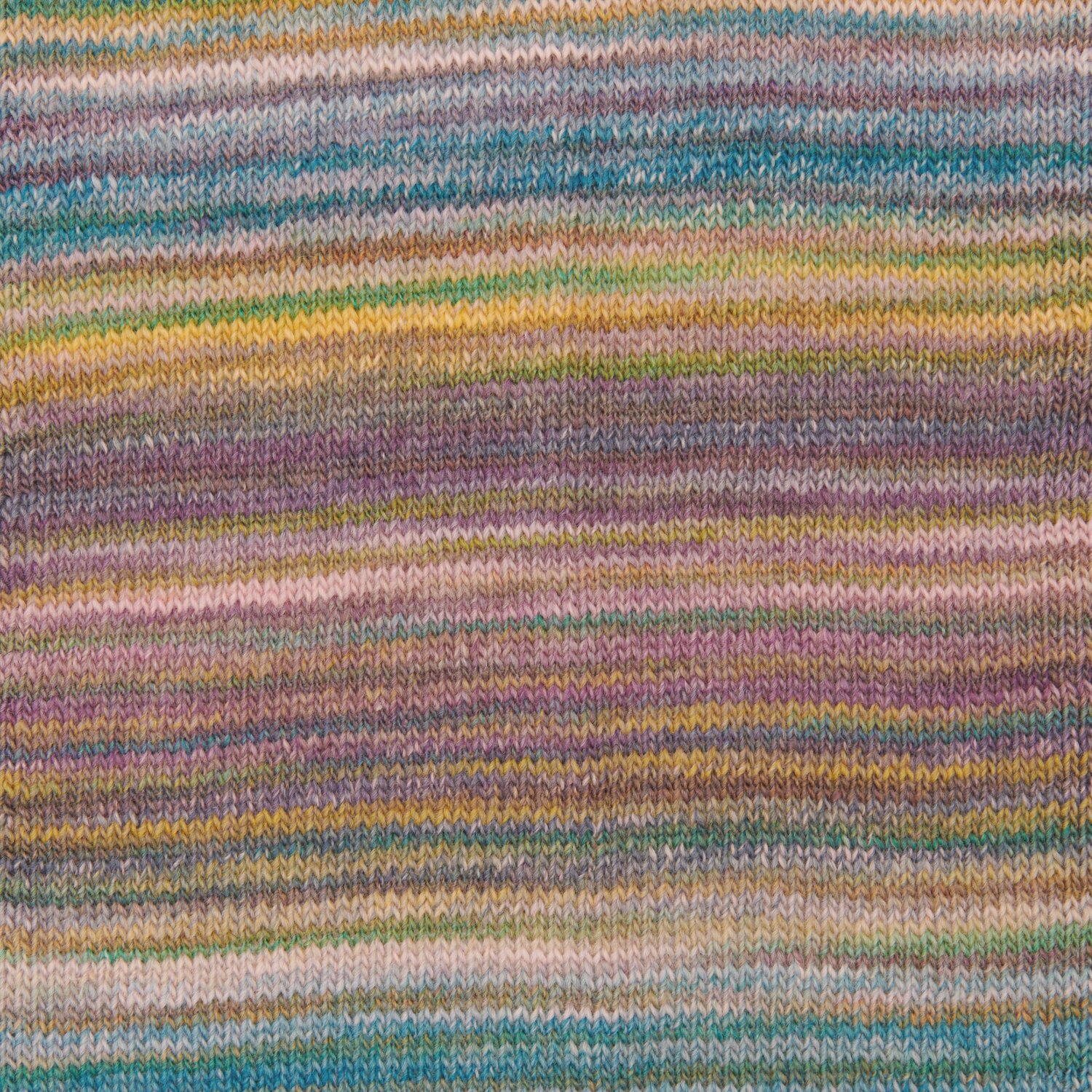 Creative Melange aran Wonderball, gestricktes Muster in Mauve-Petrol, 200g 640m, von Rico Design.