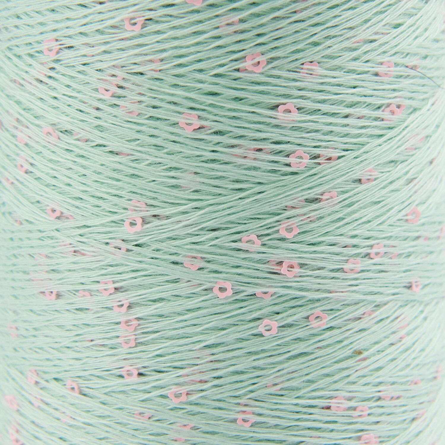 Creative Make It Blümchen: Hellblaues Garn von Rico Design mit rosa Blümchenmuster, 25g 375m. Ideal für kreative Strickprojekte.