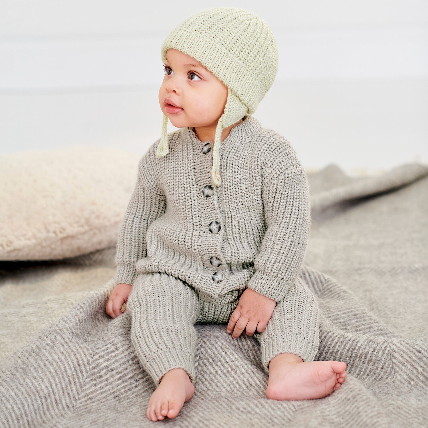 Strickanleitung Mütze und Strampler aus Rico Baby Dream dk uni