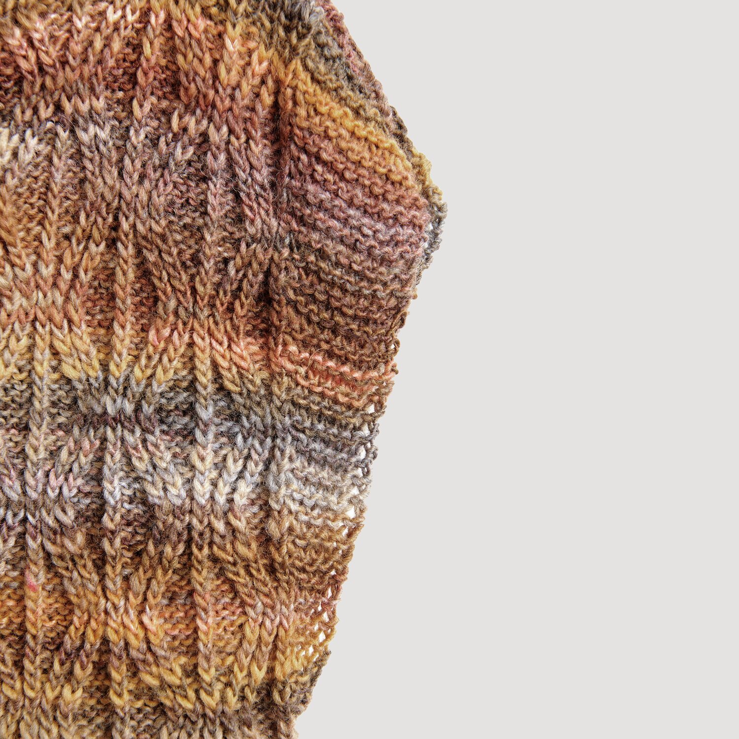 Creative Melange aran Wonderball, gestricktes Muster in warmen Herbsttönen, 200g, 640m.