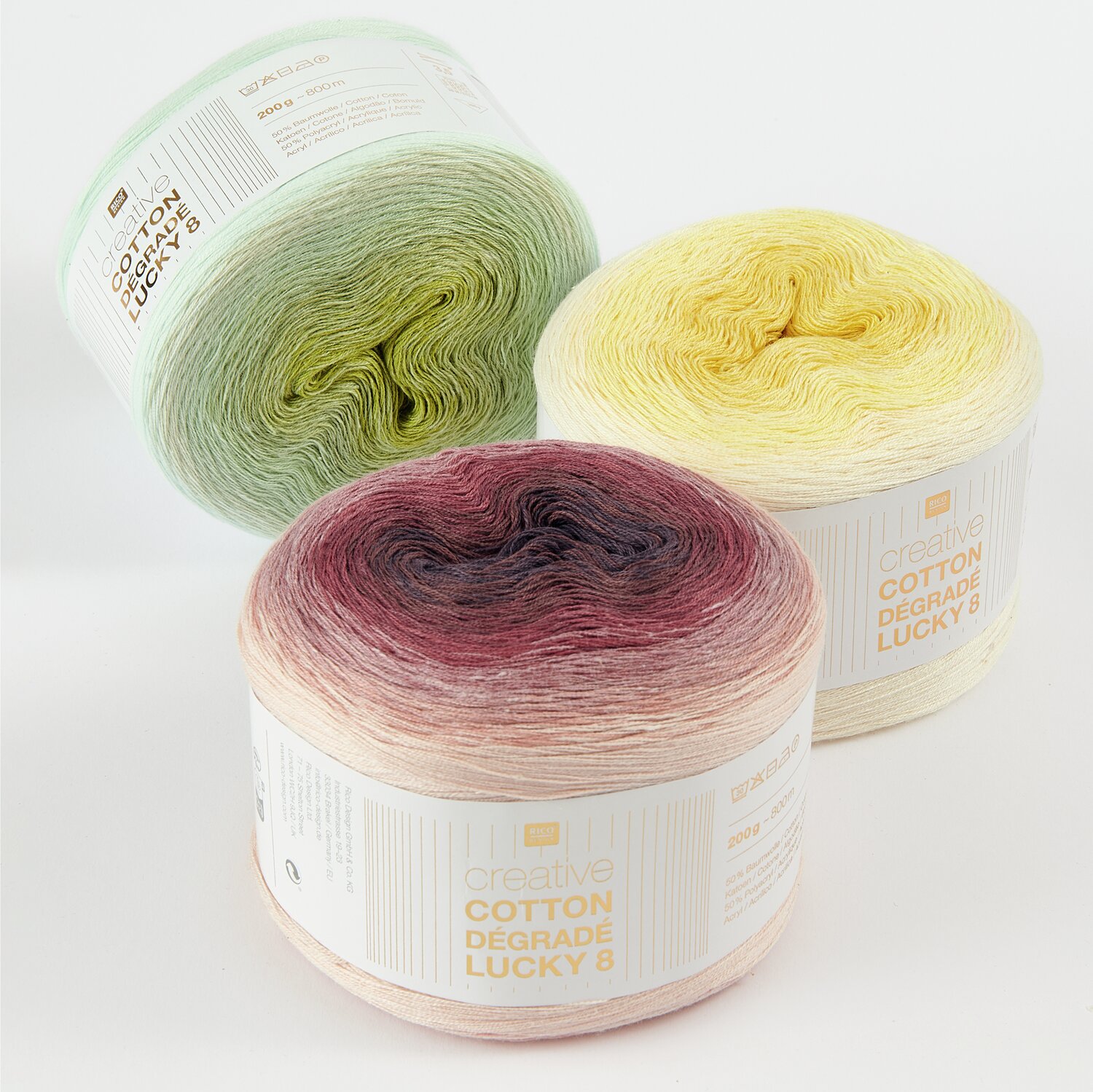 Creative Cotton Dégradé Lucky 8: Drei Garnrollen in Pastellfarben, ideal für Strickprojekte.