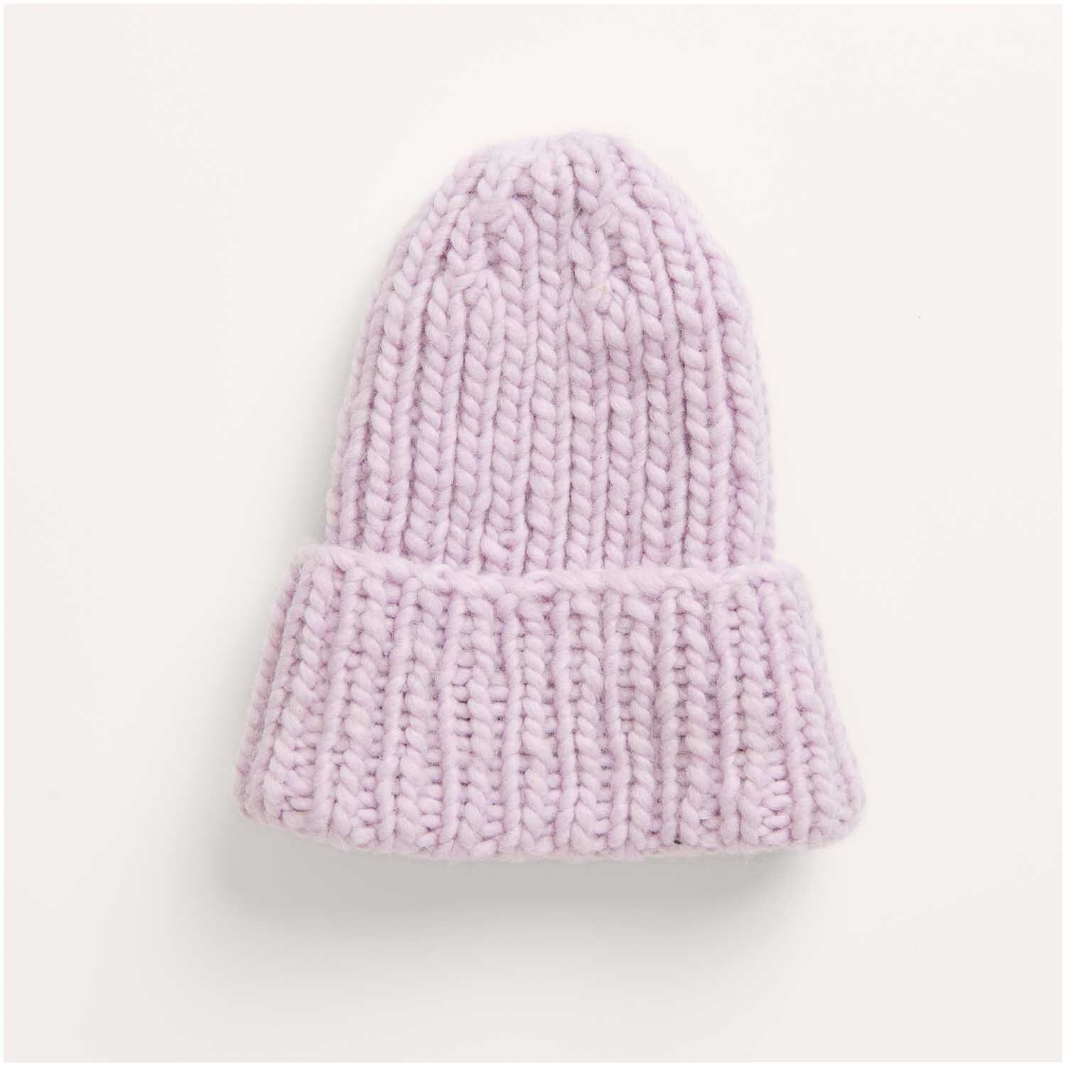 Strickset Mütze Modell 21 aus Kids Nr. 12 zeigt eine stilvolle, warme Mütze für Kinder. Ideal für kalte Tage.